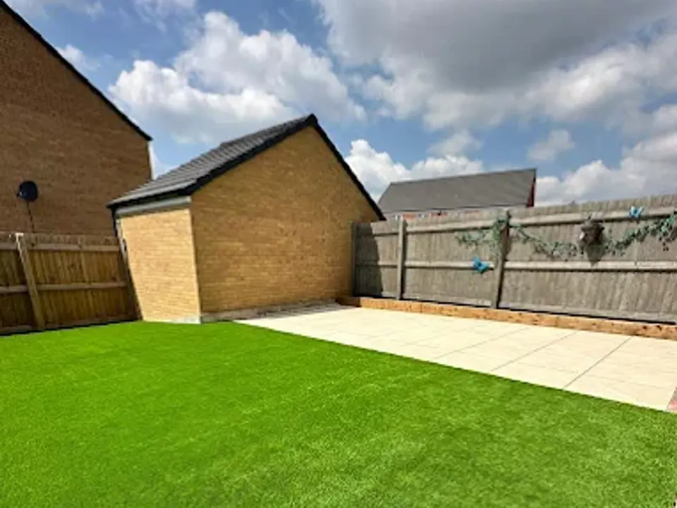 Artificial grass lawn installed in a new build garden