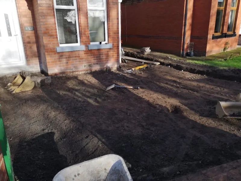 Before: front garden dug out and block paved