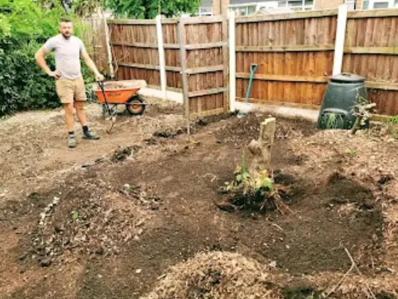 Before: bare ground turfed with a flagged path