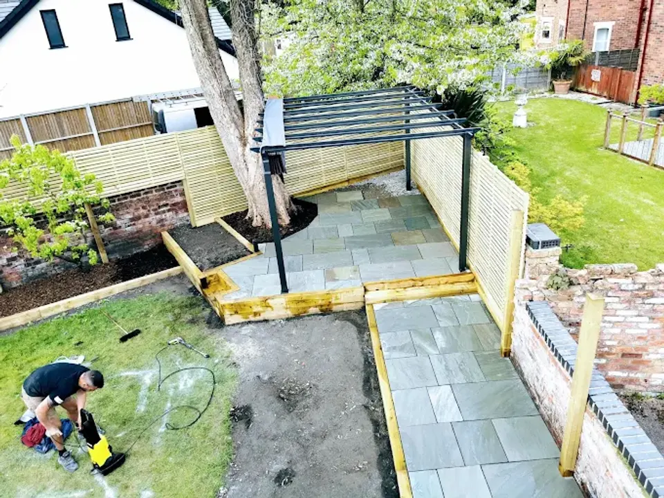 Garden design build with pergola and raised sleeper beds