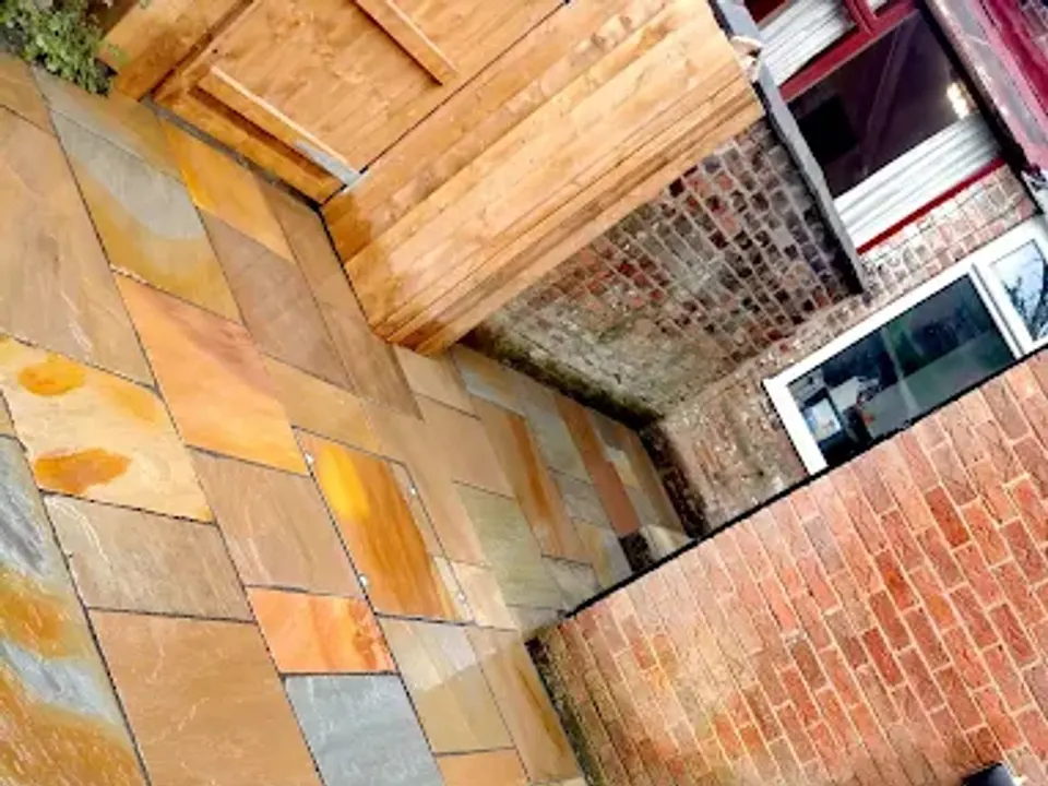 Indian sandstone patio in autumn tones