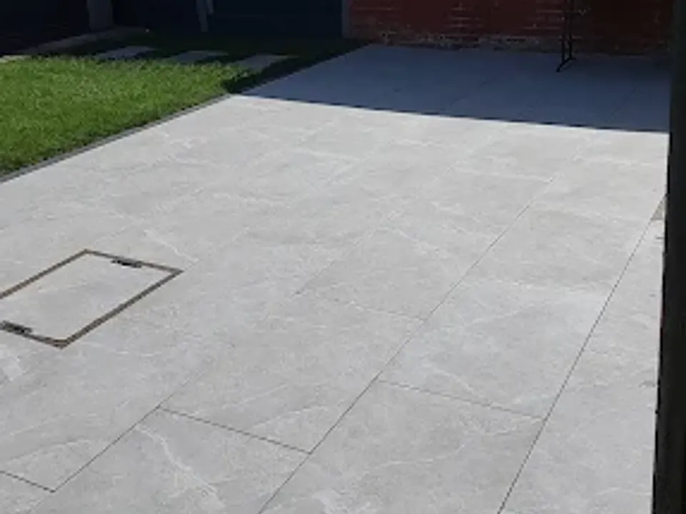 Patio with dark stained fencing