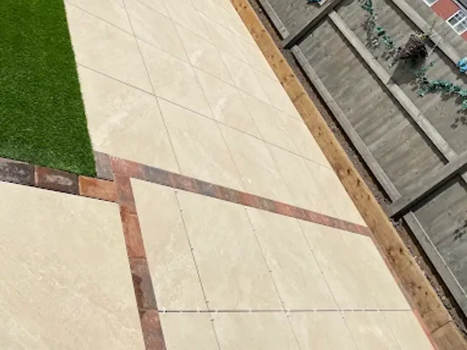 Porcelain path beside artificial grass