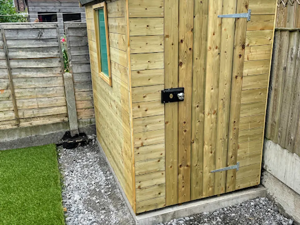 Timber shed installed on a level concrete base